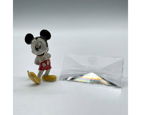 Limited edition enameled and gilded figure adorned with hand-set Swarovski crystal stones in black, yellow and red. Included 