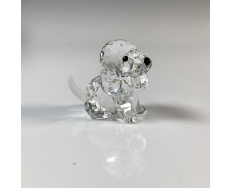 Puppy is sitting and has a clear cut crystal body with black eyes and nose. This item has its original box which measures 2.7