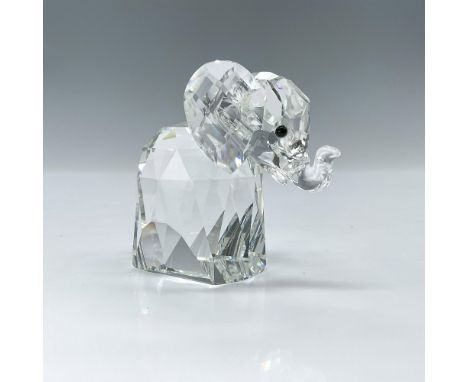This crystal elephant is made from clear crystal with black eyes and has a floppy metal tail. Swarovski backstamp. This item 