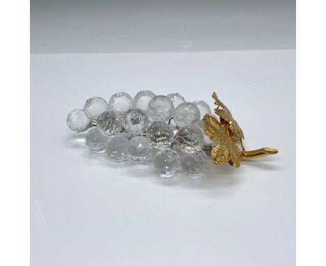 Part of the Sparkling Fruit collection. A cluster of 23 clear crystal grapes on a rhodium stem with golden leaves. Swarovski 