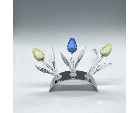 Includes rhodium stand that holds 3 flowers. This set has flowers in red and 2 yellow with clear faceted crystal leaves and s