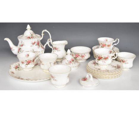 Royal Albert tea ware decorated in the Lavender Rose pattern, approximately 22 pieces including teapot and spare lid, tallest