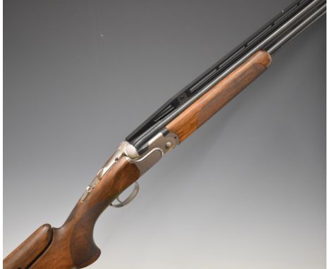 Beretta DT11 ACS 12 bore over and under ejector shotgun with named locks and underside, chequered semi-pistol grip and forend