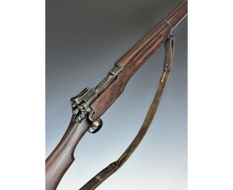 Winchester P17 .30-06 military bolt-action rifle with adjustable pop-up ladder sights, leather sling, storage compartment to 