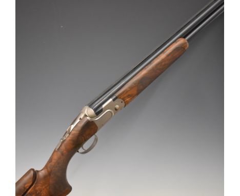 Beretta DT11 Skeet 12 bore over and under ejector shotgun with named locks and underside, chequered semi-pistol grip and fore