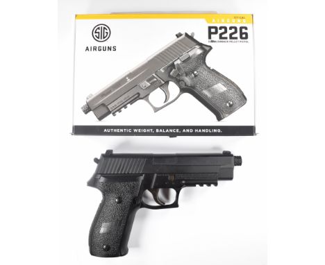 Sig Sauer P226 .177 CO2 blowback air pistol with named and textured composite grips and fixed sights, serial number 21G1870-0