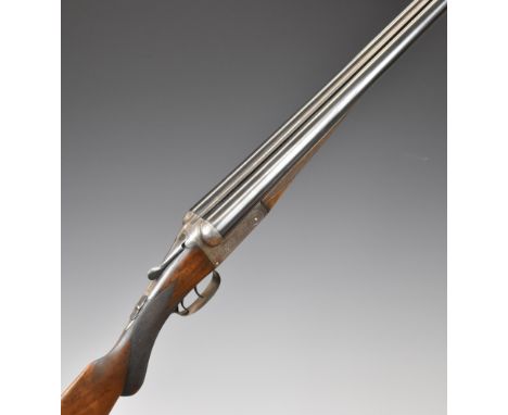F Baxter 10 bore side by side shotgun with engraved lock, trigger guard, thumb lever, fences and underside, chequered semi-pi