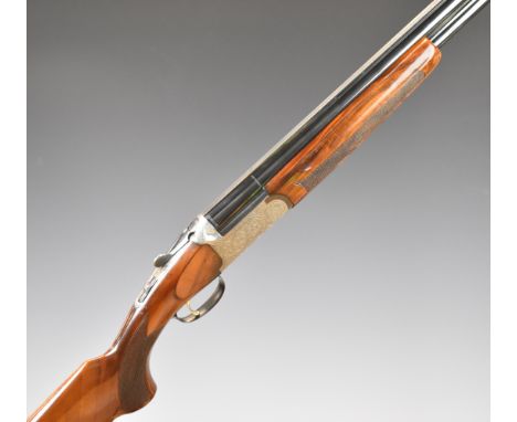Sabatti 12 bore over under ejector shotgun&nbsp;with engraved lock, underside, top plate, trigger guard and thumb lever, cheq