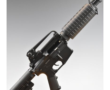 Cybergun FN Herstal US Govenment M4 Carbine .177 assault style air rifle with tactical stock, textured pistol grip, multi-sho