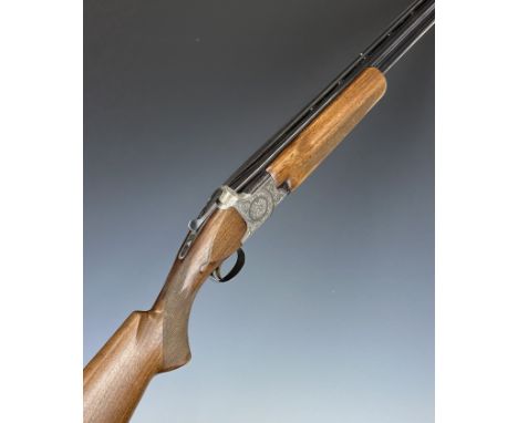 Miroku 12 bore over and under ejector shotgun with engraved locks, trigger guard, thumb lever and underside, chequered semi-p