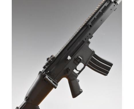 Cybergun FN Herstal Scar-L 6mm assault style airsoft rifle with tactical stock, textured pistol grip, two multi-shot magazine