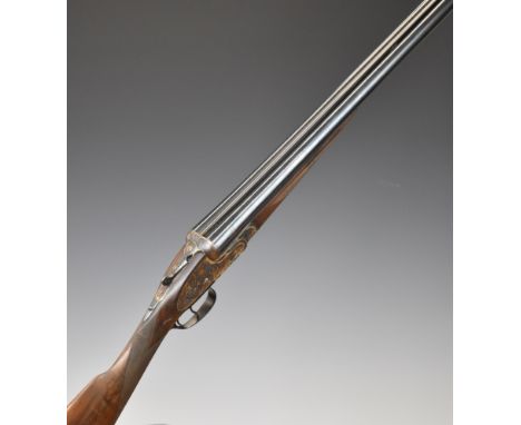 Gold Sabel 12 bore self-opening sidelock side by side ejector shotgun with fine rose and scroll engraving to the hand-detacha