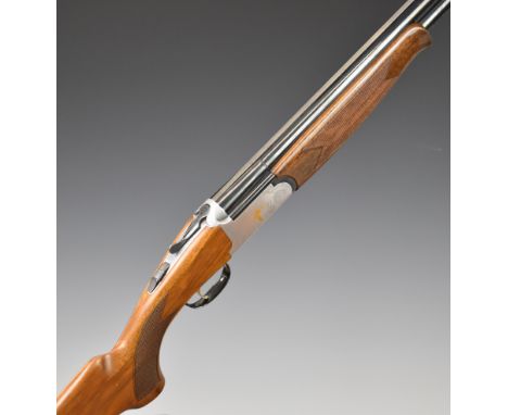 Lincoln Premier 12 bore over and under ejector shotgun with gold decoration of birds to the locks and trigger guard, engraved