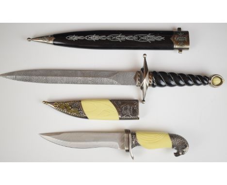 Dress dagger with 26cm Damascus blade, composite grips and decorated scabbard, together with a hunting knife with eagle head 