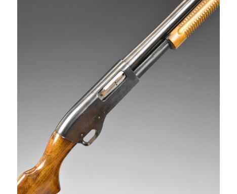 Magtech Model 586 6-shot pump-action shotgun with wooden stock and forend and 26 inch barrel choked &frac14;, overall length 