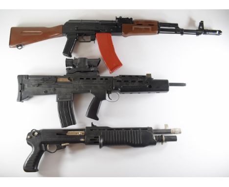 Three airsoft guns comprising two assault style rifles and one in the form of a tactical shotgun by ASGK.  PLEASE NOTE:- Befo