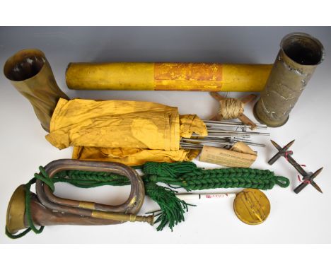 Two WW2 pieces of trench art made from brass shell casings dated 1916 and 1917 together with a bugle retailed by Henry Potter
