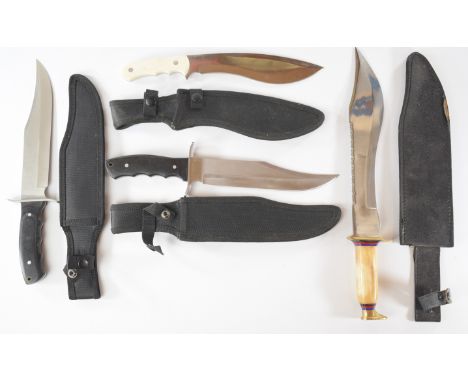 Three 'Bowie' style hunting knives together with a kukri style knife, all with sheaths, longest blade 31cm (4) PLEASE NOTE:- 