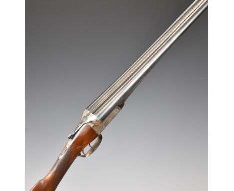 William Evans 12 bore side by side ejector shotgun with locks engraved 'William Evans From Purdey London', scrolling engravin