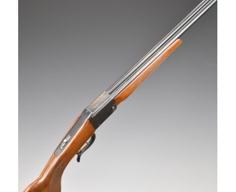 Falco .410 side by side folding poacher's shotgun with chequered semi-pistol grip and forend, sling mounts, lever action spur