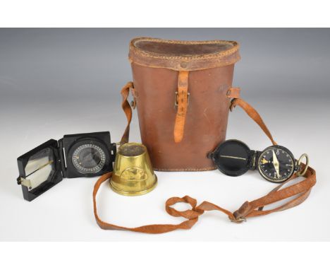 British marching compass Mk.1 by TG &amp; Co Ltd, together with a similar marching compass, binocular case and trench art ash