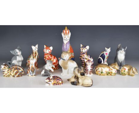 Royal Crown Derby cat paperweight, Royal Worcester cat candle snuffer, Lladro / Nao and Copenhagen cats etc., tallest 22cm