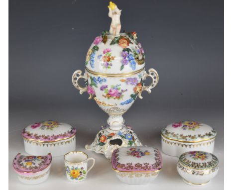 Dresden porcelain twin handled covered cup with putti finial and Watteau and applied / painted flower decoration raised on a 