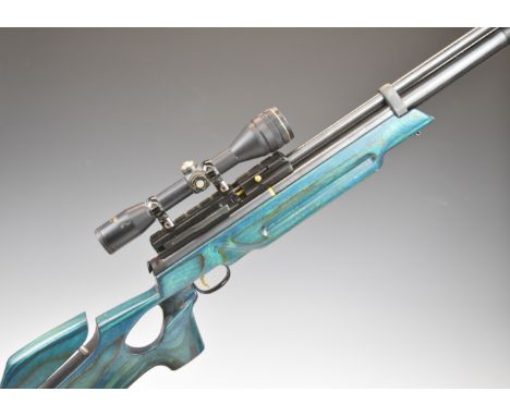Hatsan AT44-10 .177 PCP air rifle with blue laminate show wood thumb hole stock, adjustable comb, sling mounts, two 10-shot m