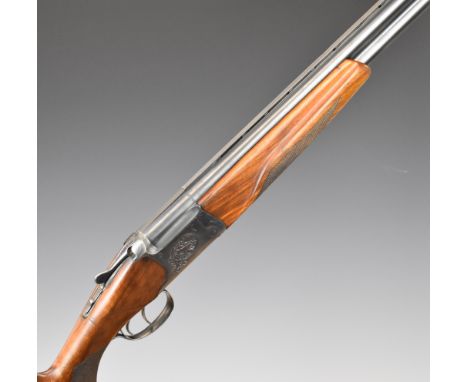 Baikal IJ-27-E 12 bore over and under ejector shotgun with engraved scenes of rabbits and birds to the locks and underside, e