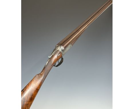 Thomas Turner 12 bore side by side shotgun with all over fine scroll engraving, named Westley Richards type thumb lever,&nbsp