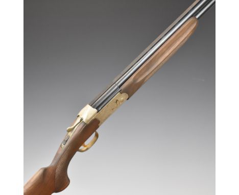 Tikka 412 S&nbsp;12 bore over and under ejector shotgun with chequered semi-pistol grip and forend, vacant shield shaped cart