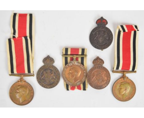 Three George VI Special Constabulary Long Service Medals for Roland U Hummel, Edgar Kershaw and Philip L Grace, together with
