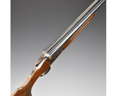 The Basque 10 bore side by side&nbsp;shotgun with chequered semi-pistol grip and forend, double trigger, vented rib and named