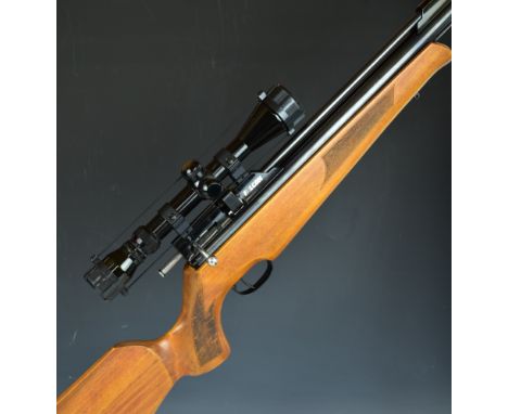 Falcon .177 bolt-action PCP air rifle with 8-shot magazine, adjustable trigger, sound moderator, raised cheek piece, chequere