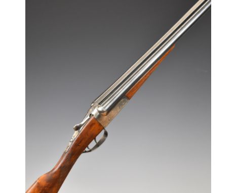 AYA 12 bore side by side shotgun with chequered grip and forend, double trigger and named 28 inch barrels choked &frac12; and