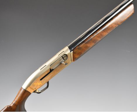 Browning Maxus Premium Grade 3 12 bore 3-shot semi-automatic shotgun with textured semi-pistol grip and forend, gold engraved