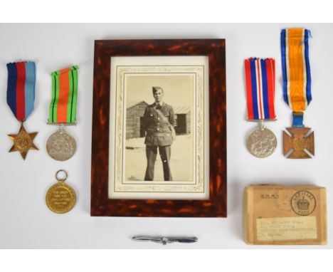 British Army WW1 Victory Medal named to 4472 Pte J W Richards, Royal Welch Fusiliers, together with a relative's WW2 medal tr