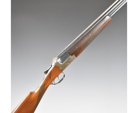 Merkel 12 bore over and under ejector shotgun with engraved scenes of birds and dogs to the locks, engraved underside, trigge