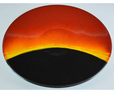 Poole pottery charger decorated in the Eclipse pattern, diameter 35cm, boxed