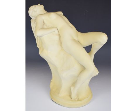 Ceramic figure of a shackled reclining nude with impressed 'NTHP, 1990' to base, height 39cm