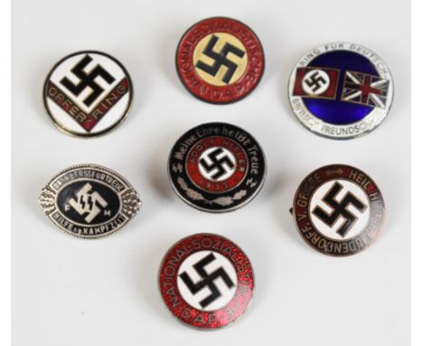 Seven WW2 German Nazi Third Reich lapel / button hole badges including Opferring, Adolf Hitler SS1933 etc