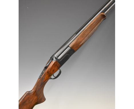 Perazzi MX12 12 bore over under ejector shotgun with engraved locks, underside, trigger guard and thumb lever, chequered semi