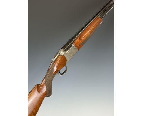 Winchester Super Grade XTR Lightweight 12 bore over and under ejector shotgun with engraved scenes of birds to the locks, eng
