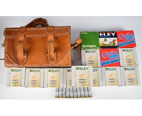 Over three hundred 12 bore mainly Eley First shotgun cartridges some in a leather cartridge case and almost all in original b
