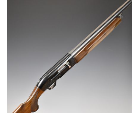Beretta A301 12 bore three-shot semi-automatic shotgun with engraved locks, chequered semi-pistol grip and forend, vented rib