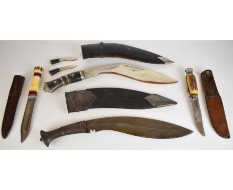 Two sheath knives by Joseph Rogers & Sons and Fagan, the latter with tools in the handle, together with two kukri knives PLEA