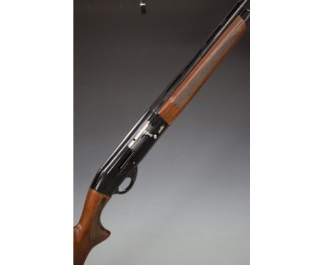 Revo Venator 12 bore semi-automatic shotgun with chequered semi-pistol grip and forend, named lock, vented top rib and 28 inc