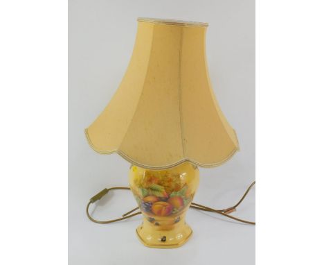 An Aynsley Pottery table lamp decorated in the Orchard Gold pattern, of hexagonal baluster form, with shade, 54cm high.