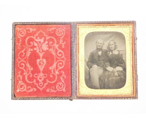 A 19thC Daguerreotype portrait of a husband and wife, 12cm x 9.5cm. NB. This lot is sold on behalf of the Estate of  John Hew