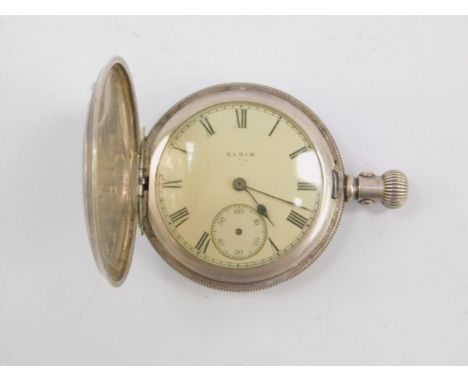 An Elgin silver lady's full hunter pocket watch, enamel dial bearing Roman numerals, subsidiary seconds dial, no 18538251, ca